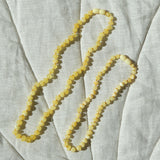 Barnsteen ketting baby/peuter - milk